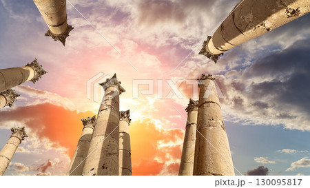 Roman Columns in the Jordanian city of Jerash (Gerasa of Antiquity), capital and largest city of Jerash Governorate, Jordan. Against the background of a beautiful sky with clouds Roman Columns in the Jordanian city of Jerash (Gerasa of Antiquity), capital and largest city of Jerash Governorate, Jordan. Against the background of a beautiful sky with clouds 130095817