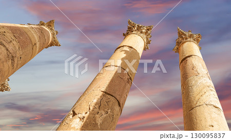 Roman Columns in the Jordanian city of Jerash (Gerasa of Antiquity), capital and largest city of Jerash Governorate, Jordan. Against the background of a beautiful sky with clouds 130095837