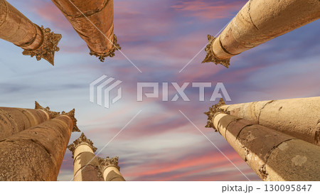 Roman Columns in the Jordanian city of Jerash (Gerasa of Antiquity), capital and largest city of Jerash Governorate, Jordan. Against the background of a beautiful sky with clouds Roman Columns in the Jordanian city of Jerash (Gerasa of Antiquity), capital and largest city of Jerash Governorate, Jordan. Against the background of a beautiful sky with clouds 130095847