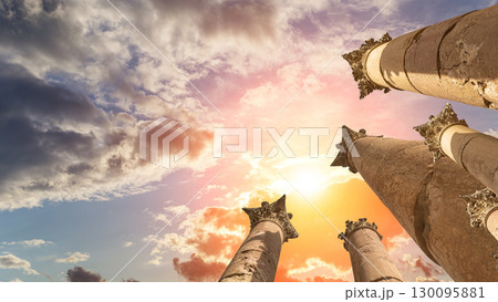 Roman Columns in the Jordanian city of Jerash (Gerasa of Antiquity), capital and largest city of Jerash Governorate, Jordan. Against the background of a beautiful sky with clouds Roman Columns in the Jordanian city of Jerash (Gerasa of Antiquity), capital and largest city of Jerash Governorate, Jordan. Against the background of a beautiful sky with clouds 130095881