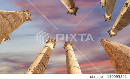 Roman Columns in the Jordanian city of Jerash (Gerasa of Antiquity), capital and largest city of Jerash Governorate, Jordan. Against the background of a beautiful sky with clouds Roman Columns in the Jordanian city of Jerash (Gerasa of Antiquity), capital and largest city of Jerash Governorate, Jordan. Against the background of a beautiful sky with clouds 130095891