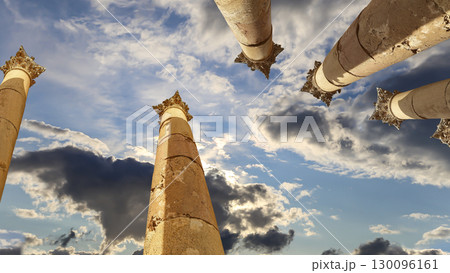 Roman Columns in the Jordanian city of Jerash (Gerasa of Antiquity), capital and largest city of Jerash Governorate, Jordan. Against the background of a beautiful sky with clouds Roman Columns in the Jordanian city of Jerash (Gerasa of Antiquity), capital and largest city of Jerash Governorate, Jordan. Against the background of a beautiful sky with clouds 130096161