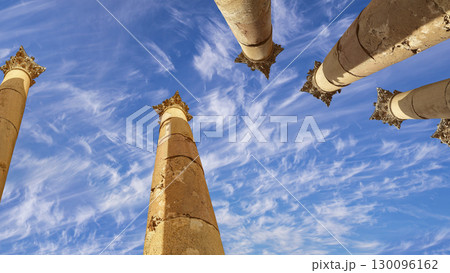 Roman Columns in the Jordanian city of Jerash (Gerasa of Antiquity), capital and largest city of Jerash Governorate, Jordan. Against the background of a beautiful sky with clouds Roman Columns in the Jordanian city of Jerash (Gerasa of Antiquity), capital and largest city of Jerash Governorate, Jordan. Against the background of a beautiful sky with clouds 130096162