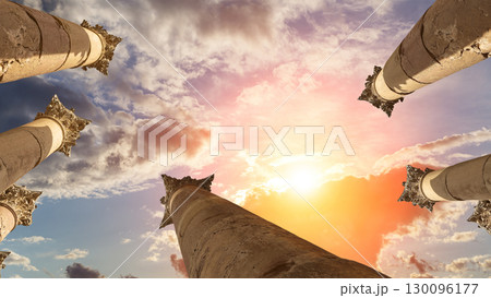 Roman Columns in the Jordanian city of Jerash (Gerasa of Antiquity), capital and largest city of Jerash Governorate, Jordan. Against the background of a beautiful sky with clouds Roman Columns in the Jordanian city of Jerash (Gerasa of Antiquity), capital and largest city of Jerash Governorate, Jordan. Against the background of a beautiful sky with clouds 130096177