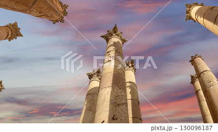 Roman Columns in the Jordanian city of Jerash (Gerasa of Antiquity), capital and largest city of Jerash Governorate, Jordan. Against the background of a beautiful sky with clouds Roman Columns in the Jordanian city of Jerash (Gerasa of Antiquity), capital and largest city of Jerash Governorate, Jordan. Against the background of a beautiful sky with clouds 130096187