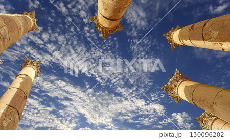 Roman Columns in the Jordanian city of Jerash (Gerasa of Antiquity), capital and largest city of Jerash Governorate, Jordan. Against the background of a beautiful sky with clouds Roman Columns in the Jordanian city of Jerash (Gerasa of Antiquity), capital and largest city of Jerash Governorate, Jordan. Against the background of a beautiful sky with clouds 130096202