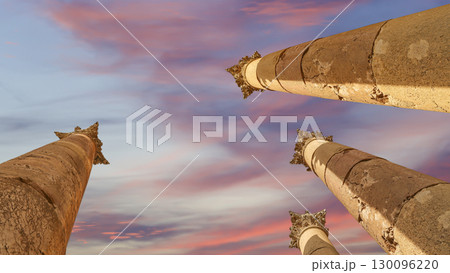 Roman Columns in the Jordanian city of Jerash (Gerasa of Antiquity), capital and largest city of Jerash Governorate, Jordan. Against the background of a beautiful sky with clouds Roman Columns in the Jordanian city of Jerash (Gerasa of Antiquity), capital and largest city of Jerash Governorate, Jordan. Against the background of a beautiful sky with clouds 130096220