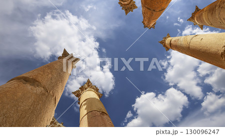 Roman Columns in the Jordanian city of Jerash (Gerasa of Antiquity), capital and largest city of Jerash Governorate, Jordan. Against the background of a beautiful sky with clouds 130096247