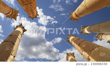 Roman Columns in the Jordanian city of Jerash (Gerasa of Antiquity), capital and largest city of Jerash Governorate, Jordan. Against the background of a beautiful sky with clouds Roman Columns in the Jordanian city of Jerash (Gerasa of Antiquity), capital and largest city of Jerash Governorate, Jordan. Against the background of a beautiful sky with clouds 130096330