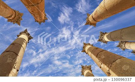 Roman Columns in the Jordanian city of Jerash (Gerasa of Antiquity), capital and largest city of Jerash Governorate, Jordan. Against the background of a beautiful sky with clouds Roman Columns in the Jordanian city of Jerash (Gerasa of Antiquity), capital and largest city of Jerash Governorate, Jordan. Against the background of a beautiful sky with clouds 130096337