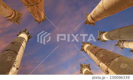 Roman Columns in the Jordanian city of Jerash (Gerasa of Antiquity), capital and largest city of Jerash Governorate, Jordan. Against the background of a beautiful sky with clouds 130096339