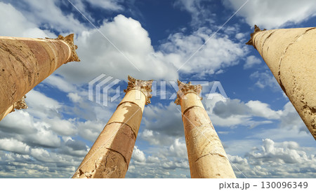 Roman Columns in the Jordanian city of Jerash (Gerasa of Antiquity), capital and largest city of Jerash Governorate, Jordan. Against the background of a beautiful sky with clouds Roman Columns in the Jordanian city of Jerash (Gerasa of Antiquity), capital and largest city of Jerash Governorate, Jordan. Against the background of a beautiful sky with clouds 130096349