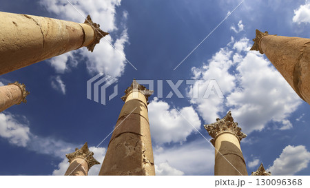 Roman Columns in the Jordanian city of Jerash (Gerasa of Antiquity), capital and largest city of Jerash Governorate, Jordan. Against the background of a beautiful sky with clouds Roman Columns in the Jordanian city of Jerash (Gerasa of Antiquity), capital and largest city of Jerash Governorate, Jordan. Against the background of a beautiful sky with clouds 130096368