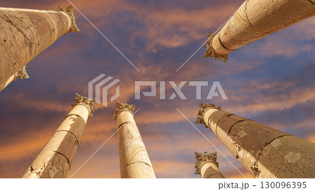 Roman Columns in the Jordanian city of Jerash (Gerasa of Antiquity), capital and largest city of Jerash Governorate, Jordan. Against the background of a beautiful sky with clouds 130096395