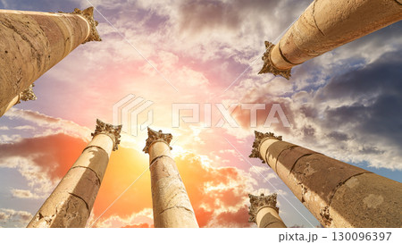 Roman Columns in the Jordanian city of Jerash (Gerasa of Antiquity), capital and largest city of Jerash Governorate, Jordan. Against the background of a beautiful sky with clouds 130096397
