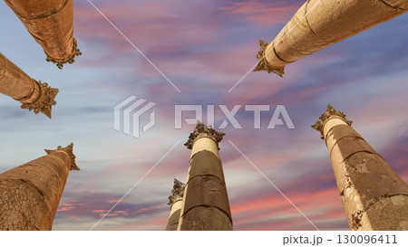 Roman Columns in the Jordanian city of Jerash (Gerasa of Antiquity), capital and largest city of Jerash Governorate, Jordan. Against the background of a beautiful sky with clouds Roman Columns in the Jordanian city of Jerash (Gerasa of Antiquity), capital and largest city of Jerash Governorate, Jordan. Against the background of a beautiful sky with clouds 130096411