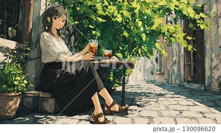 緑に囲まれたカフェでリラックスする女性 130096620