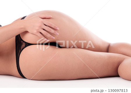 Sexy female ass, isolated on a white background 130097813