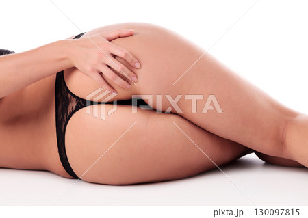 Sexy female ass, isolated on a white background Sexy female ass, isolated on a white background 130097815