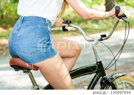 Woman on a bike Woman on a bike 130097859