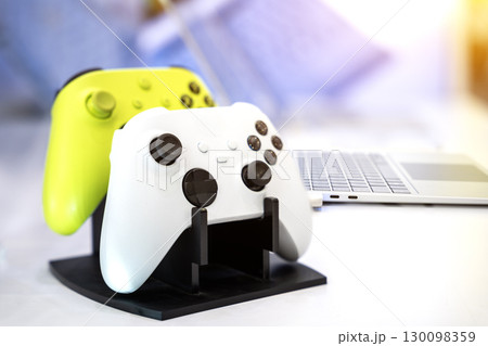 Next Generation video game console controller isolated on white background. 130098359