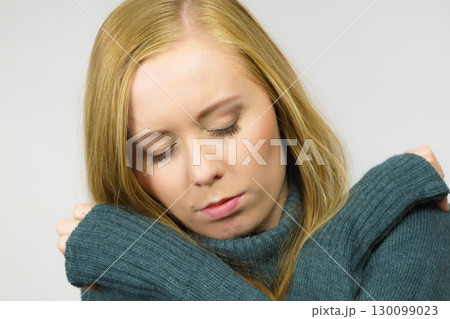 Sad unhappy young female 130099023