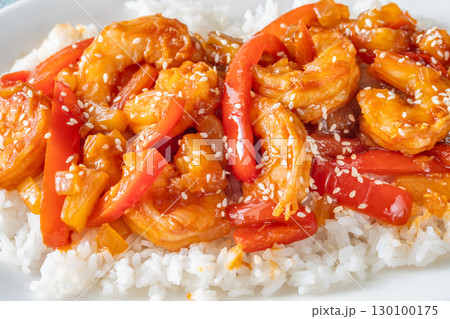 Sweet sour prawns with pineapple bell peppers onions served with rice Sweet sour prawns with pineapple bell peppers onions served with rice 130100175