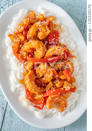 Sweet sour prawns with pineapple bell peppers onions served with rice Sweet sour prawns with pineapple bell peppers onions served with rice 130100176