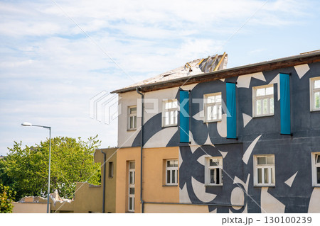 Demolition of old buildings on a street in Prague with only facades remaining. Concept of urban transformation, architectural change and preparation for new construction projects. Demolition of old buildings on a street in Prague with only facades remaining. Concept of urban transformation, architectural change and preparation for new construction projects. 130100239