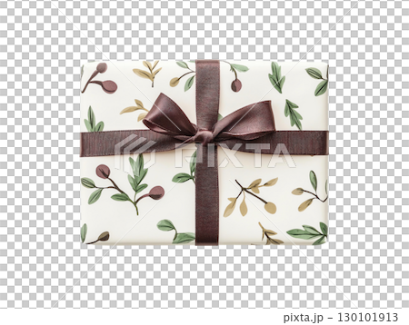 beautifully wrapped gift with floral design and brown ribbon, perfect for any occasion. elegant presentation adds touch of charm and warmth 130101913