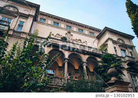 Elegant Facade of Historic European Mansion with Ornate Balcony 130102953