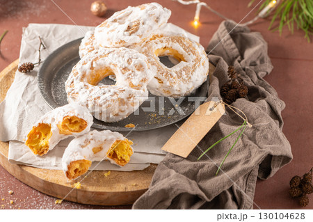 Portuguese sweets named argolas das Caldas - Rings from Caldas. Typical glazed cookies with sugar. Regional sweet from Caldas da Rainha, Portugal. 130104628