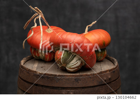 Turban Squash Turks Turban on Rustic Wooden Barrel Turban Squash Turks Turban on Rustic Wooden Barrel 130104662