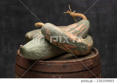 Candy Roaster Squash Pumpkins on Wooden Barrel Candy Roaster Squash Pumpkins on Wooden Barrel 130104663