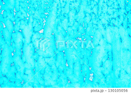 Old blue paint peeling from metal or concrete wall texture background. Old blue paint peeling from metal or concrete wall texture background. 130105056