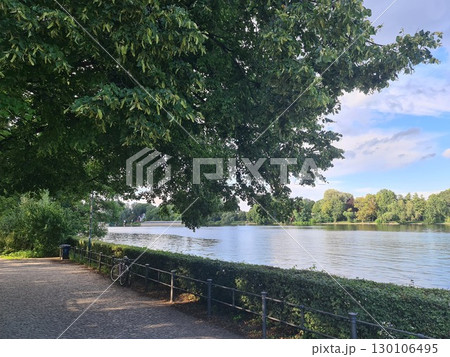The river Spree in Treptower Park, Berlin, Germany. Treptower Park is a park alongside the river Spree in Alt-Treptow, in the district of Treptow - Kopenick, south of central Berlin 130106495