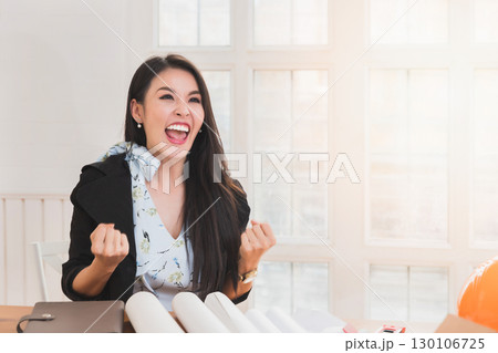 Asian female architect clenched her fists and shouted YEAH!! Glad to know that the client like her work and agrees to sign a contract. Successful project. Asian female architect clenched her fists and shouted YEAH!! Glad to know that the client like her work and agrees to sign a contract. Successful project. 130106725