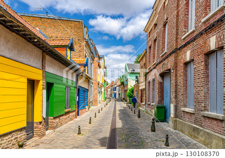 Colorful houses of Amiens historical city centre Saint-Leu quarter. Narrow cozy street between brick buildings old town in France, Picardy, Somme department, Hauts-de-France Region, Northern France Colorful houses of Amiens historical city centre Saint-Leu quarter. Narrow cozy street between brick buildings old town in France, Picardy, Somme department, Hauts-de-France Region, Northern France 130108370