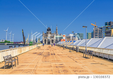 Embankment promenade of Scheldt river on Cruise ponton and Maritiem Park Afdaken, port area in Antwerp city historical centre, Antwerpen old town, Flemish Region, Belgium Embankment promenade of Scheldt river on Cruise ponton and Maritiem Park Afdaken, port area in Antwerp city historical centre, Antwerpen old town, Flemish Region, Belgium 130108372