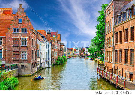 Row of old buildings houses on bank of Lys Leie river in Patershol quarter district in Ghent historical city centre, Gent old town, East Flanders province, Flemish Region, Belgium 130108450