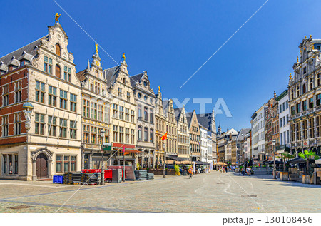 Antwerpen old town with typical flemish style houses buildings with gables and street restaurants on Grote Markt Big Market Square pedestrian street in Antwerp city historical centre, Belgium Antwerpen old town with typical flemish style houses buildings with gables and street restaurants on Grote Markt Big Market Square pedestrian street in Antwerp city historical centre, Belgium 130108456