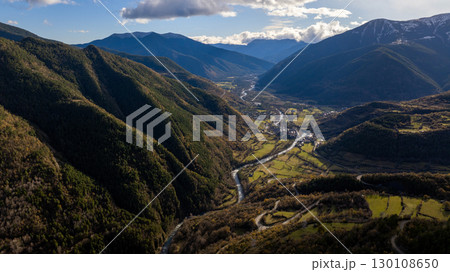 Aerial view of the Arazas river flowing through the Ordesa valley in the Huesca Pyrenees, Aragon, Spain, with lush vegetation and winding roads Aerial view of the Arazas river flowing through the Ordesa valley in the Huesca Pyrenees, Aragon, Spain, with lush vegetation and winding roads 130108650
