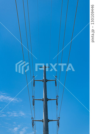 high voltage powerline. powerful substation. electricity provider. powering pylon utility. electricity power lines. pylon producing energy. voltage transmission on electric tower outdoor 130109446