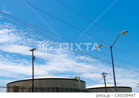 electricity power lines wire. wire producing energy. voltage transmission on electric wire. high voltage powerline. powerful powerline. electricity provider 130109447