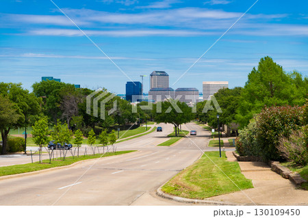 empty road with destination in horizon with cityscape. road way with power lines. travelling by road way. road way with no cars 130109450