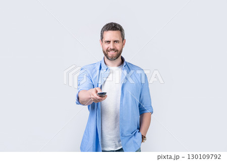 happy man click television remote. photo of man click television remote. happy man click television remote. photo of man click television remote. 130109792