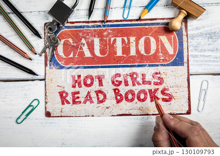 Caution Sign Saying Hot Girls Read Books on Rustic White Background 130109793