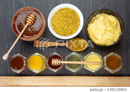 Hexagonal jars with different types and colors of fresh flower honey Hexagonal jars with different types and colors of fresh flower honey 130110063