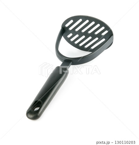 Black plastic potato masher isolated on white. 130110203
