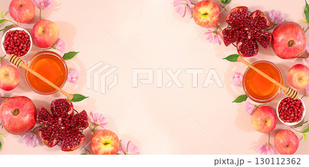 Autumn banner with honey, apples, pomegranates, flowers, dried fruits for holiday greeting, composition for Jewish holiday Rosh Hashanah with traditional symbols, creative layout for design, template Autumn banner with honey, apples, pomegranates, flowers, dried fruits for holiday greeting, composition for Jewish holiday Rosh Hashanah with traditional symbols, creative layout for design, template 130112362